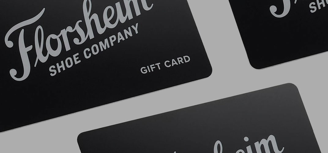 The image features black Florsheim Shoe Company gift cards on a white background. Shop the Gift Cards category now. 