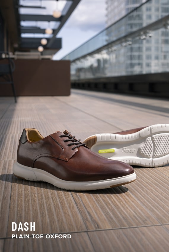 Men's Newest Shoes category. Image features the Dash Plain Toe oxford in cognac.