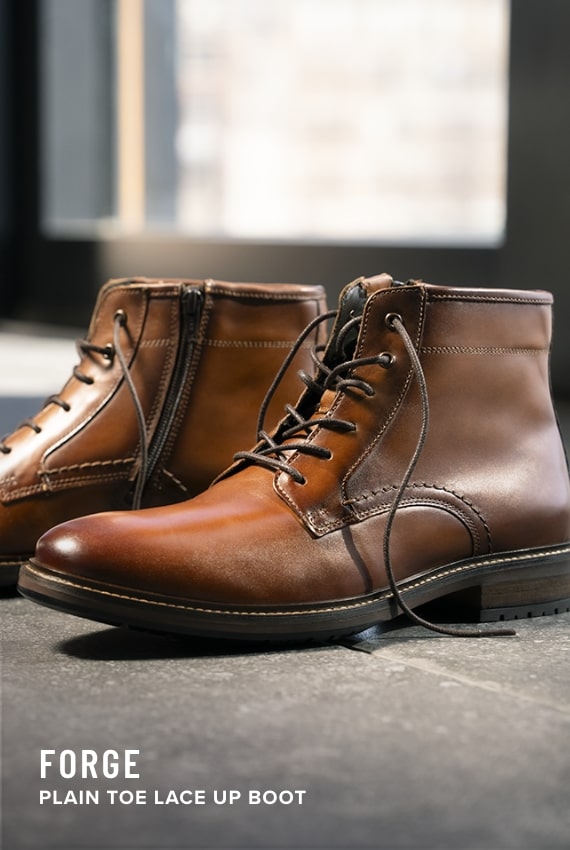 Men's Newest Shoes category. Image features the Forge plain toe boot in cognac.