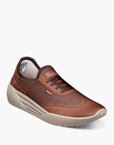 Wing It Classic Laceless Slip On Sneaker in Cognac for $140.00 dollars.